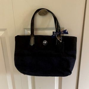 Coach black and blue wool purse. Looped handles.